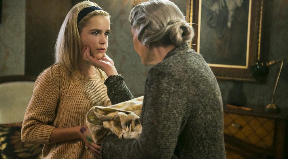 From left to right: Kiernan Shipka ("Cathy," left) and Ellen Burstyn ("Olivia," right) star in Lionsgate Home Entertainment's FLOWERS IN THE ATTIC.