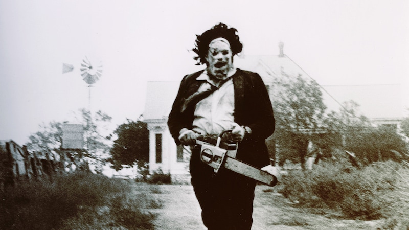 Leatherface running towards the camera in The Texas Chainsaw Massacre