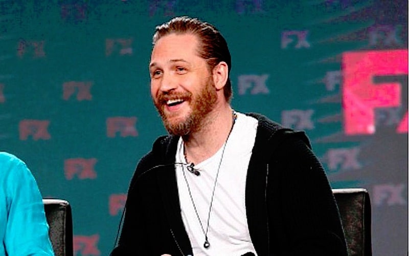 Tom Hardy speaking on stage at the TCA winter press tour