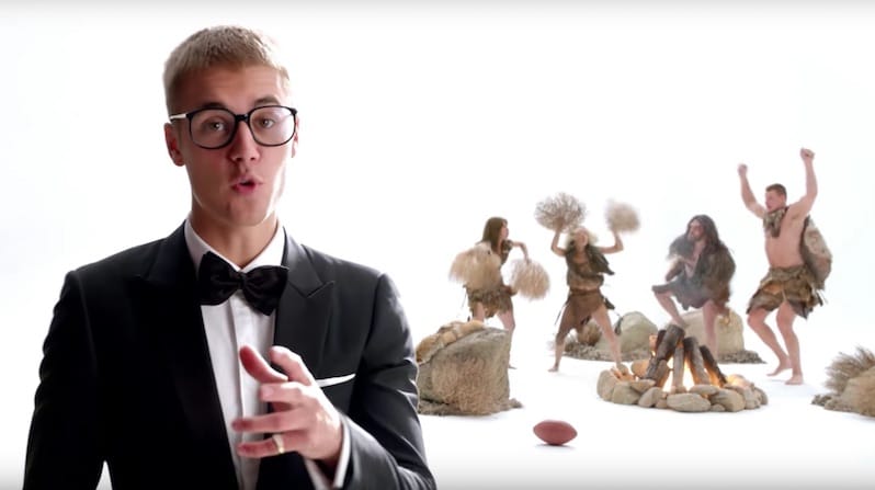 Justin Bieber with Rob Gronkowski in the background during the 2017 T-Mobile Super Bowl commercial