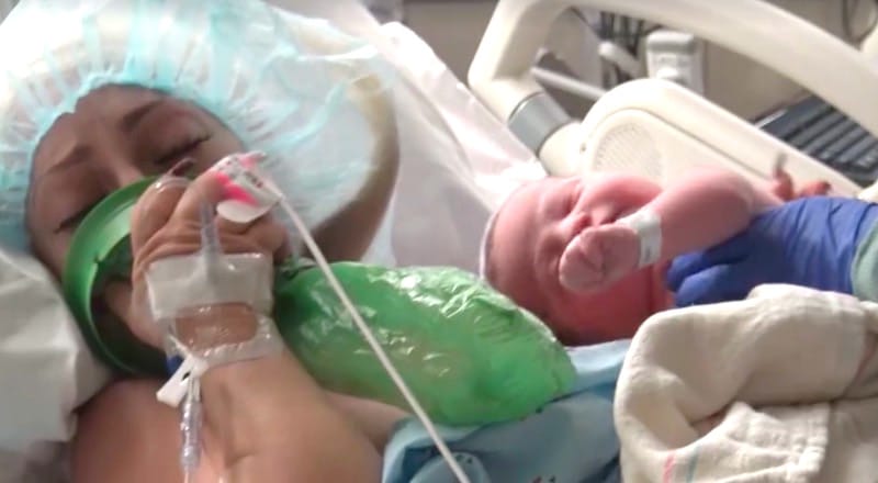 Jasmine breathes gas as newborn Benjamin is taken off her by a nurse on Little Women: LA