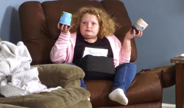 Honey Boo Boo holds up Mama June's ice-cream stash with a look that says "WTF?"