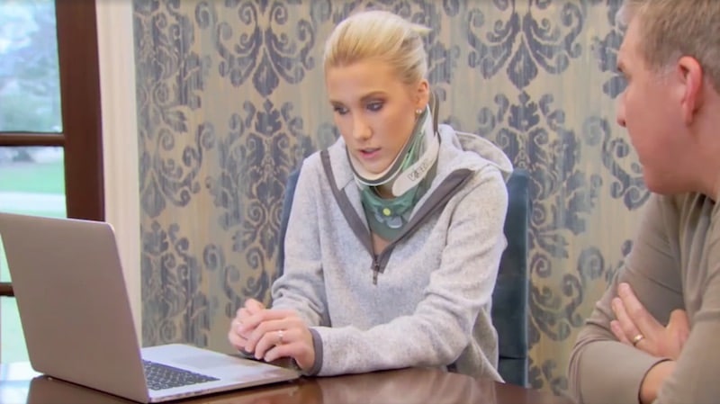 Savannah works on her fashion line while still wearing a neck brace on Chrisley Knows Best