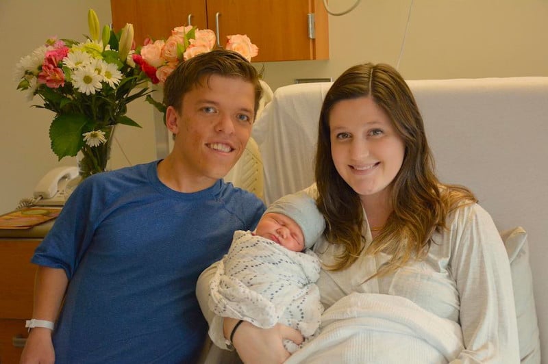Little People, Big World's Zach and Tori Roloff posing with son Jackson after his birth