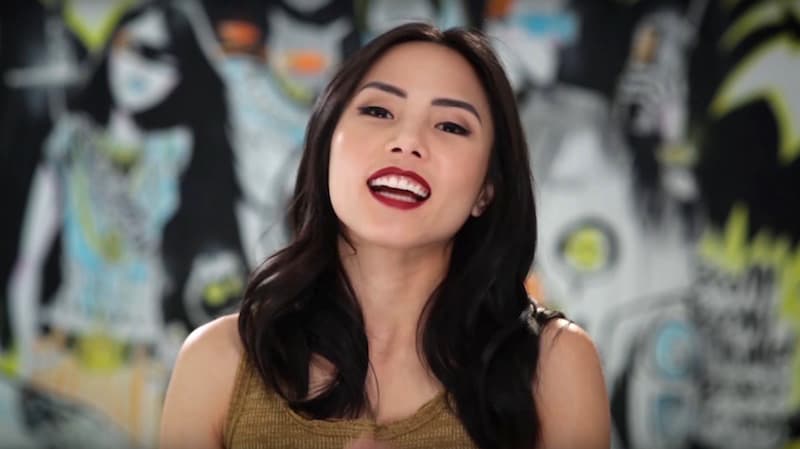 Anna Akana speaking to the camera in a YouTube video