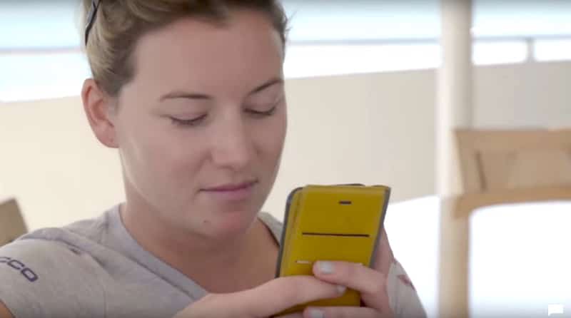 Hannah Ferrier using her phone to text on this season of Below Deck Mediterranean