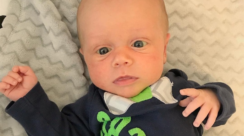 A photo of Zach and Tori Roloff's son Jackson in a Seattle Seahawks babygrow