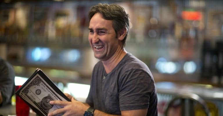 Mike Wolfe laughing in a scene from American Pickers