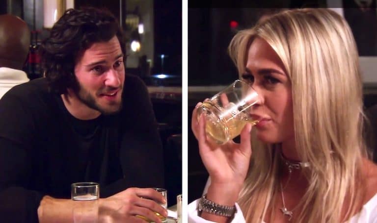 Steve Gold and his date Taylor, who is drinking a whisky, on Million Dollar Listing New York