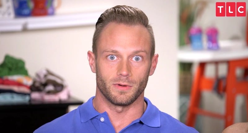 A wide-eyed Adam Busby talking to the camera on Outdaughtered