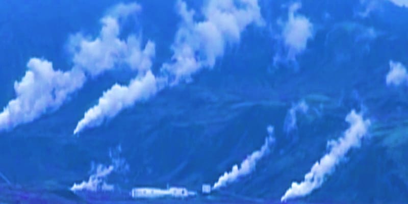 Color enhanced photo of geothermal steam rising in Iceland