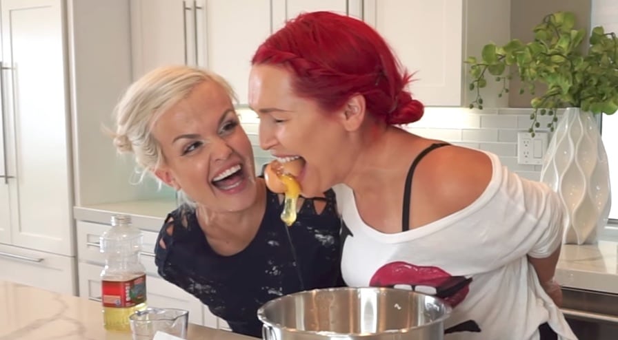 Terra Jole and Elena Gant cooking with no hands in a YouTube video