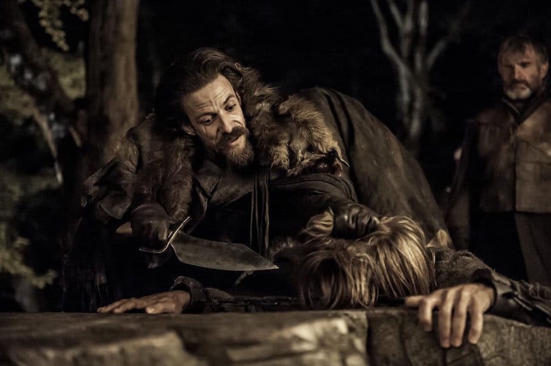 Noah Taylor as Locke holding a knife over Jaime Lannister on Game of Thrones