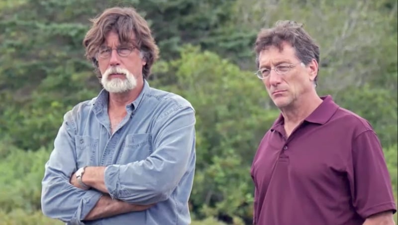 Rick and Marty Lagina standing by a dig on The Curse of Oak Island