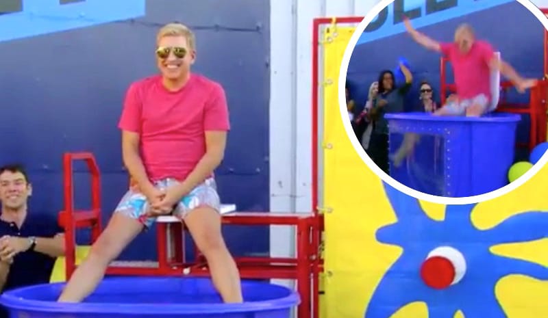 Todd Chrisley sitting above a dunk pool on According To Chrisley