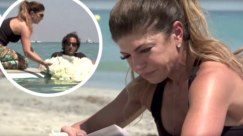 Teresa Giudice crying on a beach and releasing a wreath of white roses at sea