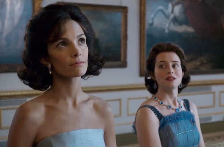 Jodi Balfour as Jackie Kennedy standing next to Clair Foy as the Queen