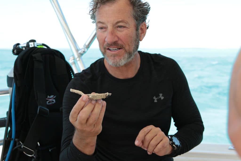 Darrell Miklos showing a recently discovered spoon on Cooper's Treasure Season 2
