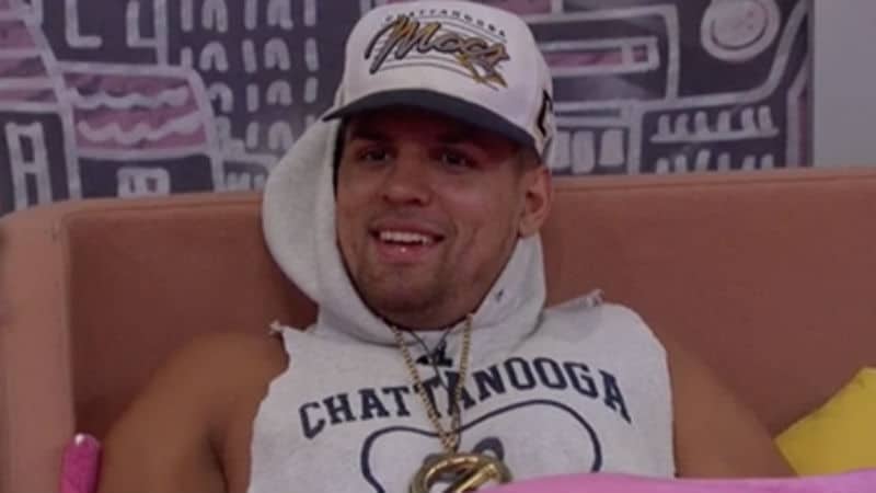 Faysal wearing the Power of Veto necklace in the Big Brother house