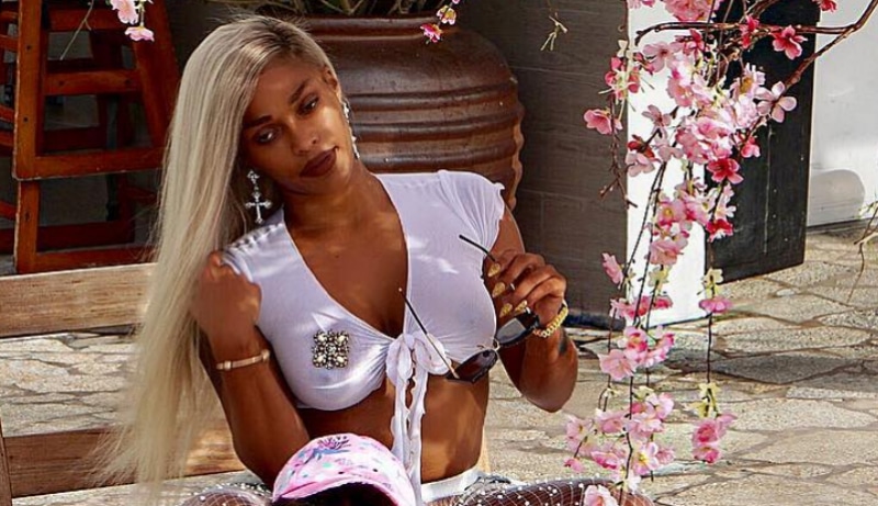 Joseline Hernandez sitting with her daughter Bonnie Bella in a photo shared to Instagram