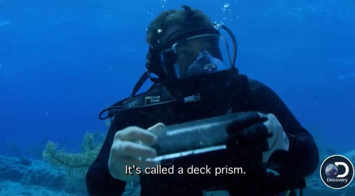 Diver holding deck prism on Cooper's Treasure