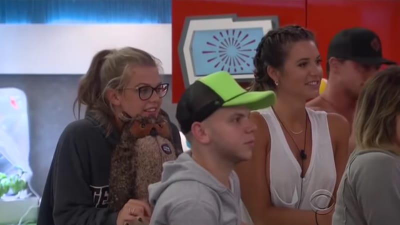 Haleigh, JC, Angela and part of Sam's face as they watch Zingbot on Big Brother 20