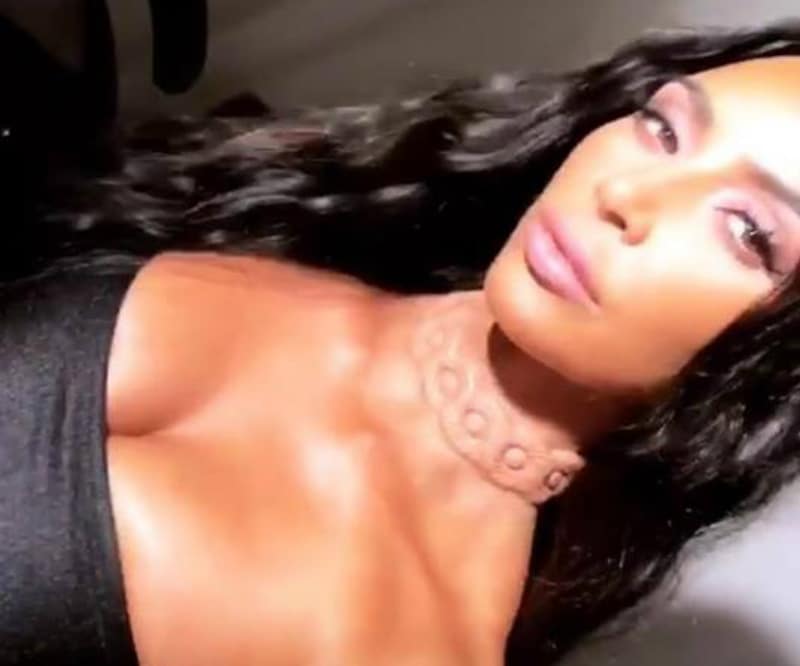 Kim Kardashian wearing a glowing implant necklace on Instagram