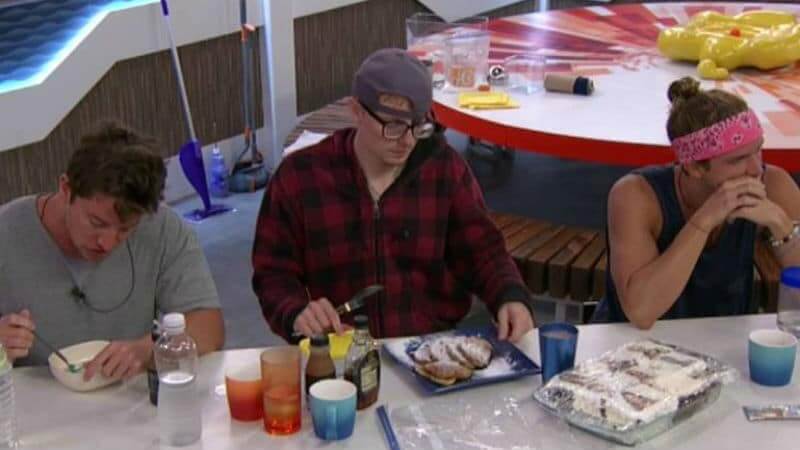 Brett, Scottie, and Tyler at the counter in the Big Brother house