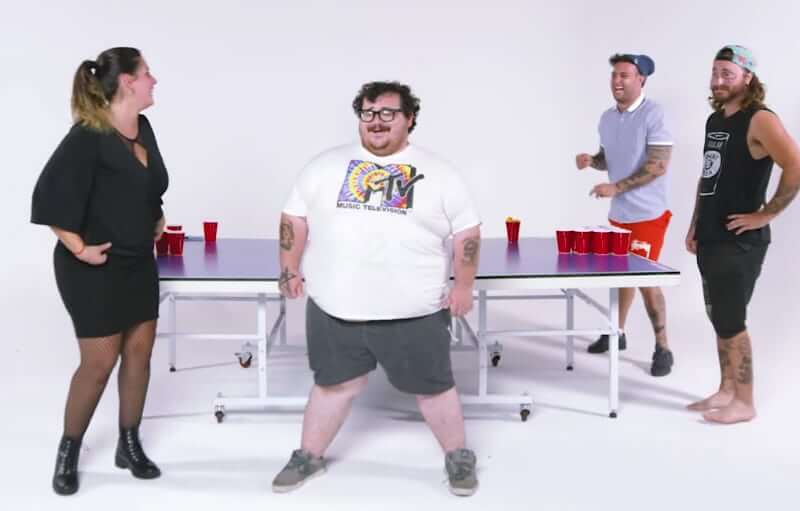Zach Holmes and his friends play their version of beer pong on Too Stupid To Die