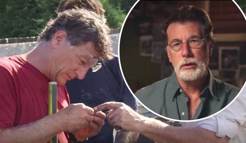 Rick and Marty Lagina and what's thought to be the piece of treasure found on The Curse of Oak Island