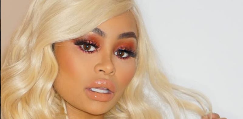 Blac Chyna poses with blonde hair and a vacant stare