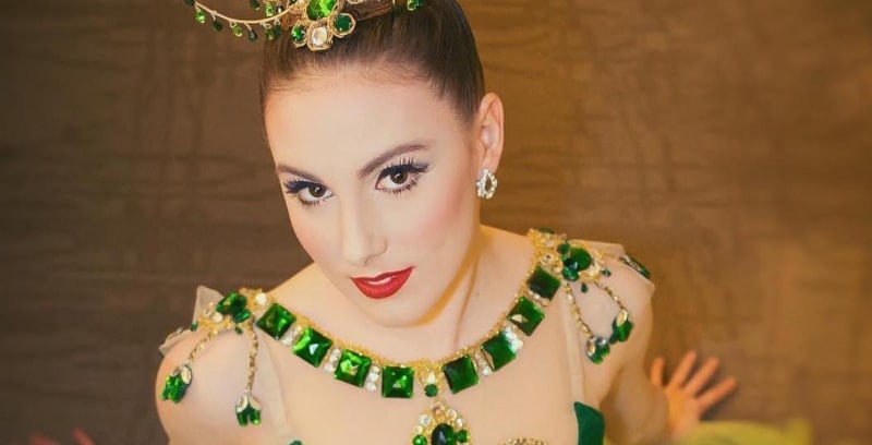 Tiler Peck dressed in emerald green for a performance with the NYC ballet