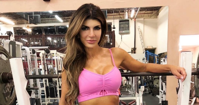 Teresa Giudice in the gym training for a weight lifting competition.