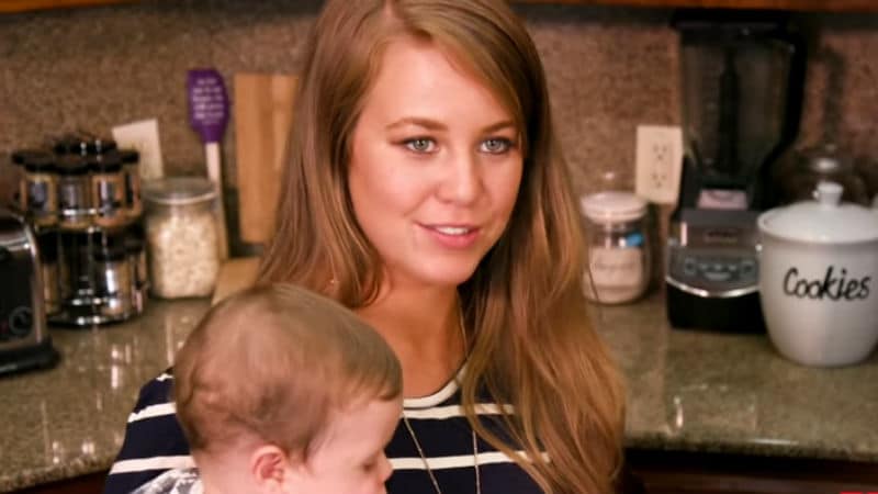 Jana Duggar holding her nephew while on Counting On
