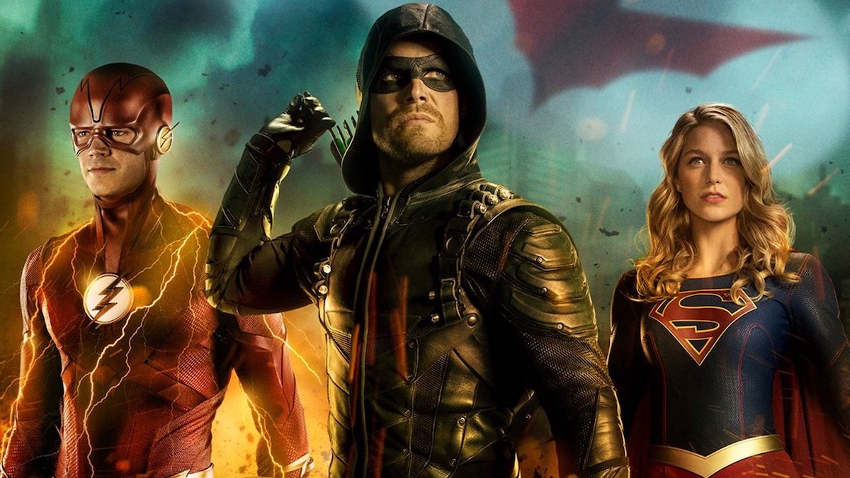 Grant Gustin as The Flash, Stephen Amell as the Green Arrow, and Melissa Benoist as Supergirl.