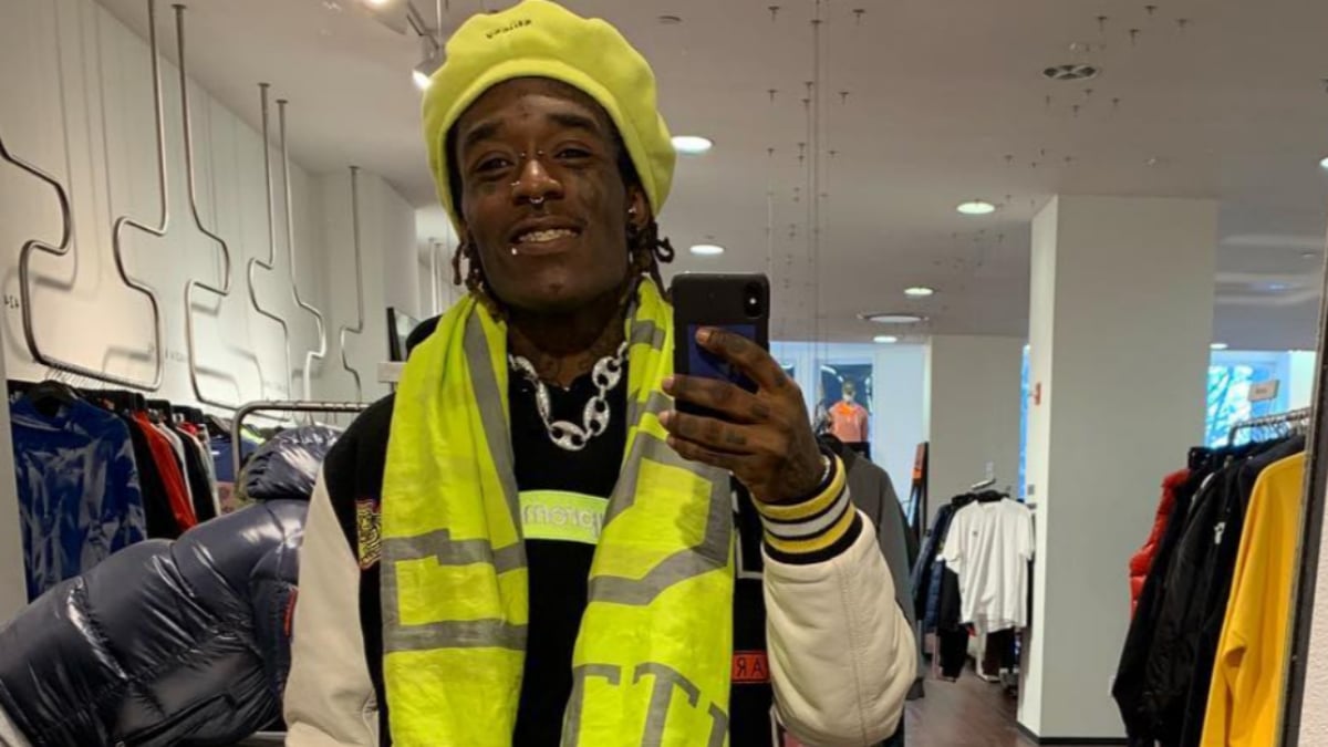 Lil Uzi Vert covers up his dreads with a yellow hat