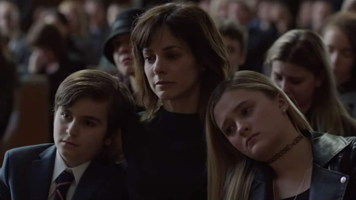 Delilah and her children at Jon's funeral