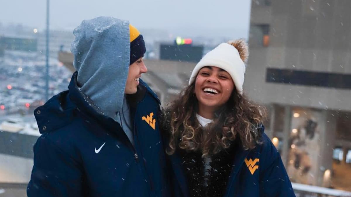 Nash Grier and Taylor Giavasis pose together in the snow