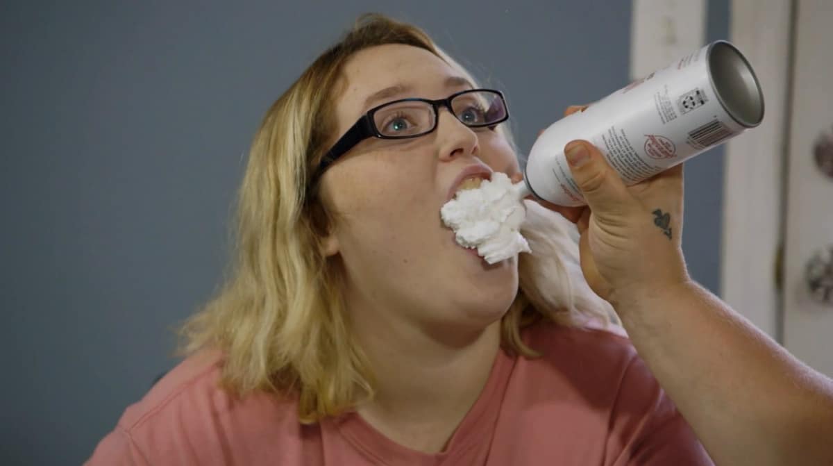 Pumpkin gets whipped cream sprayed in her mouth