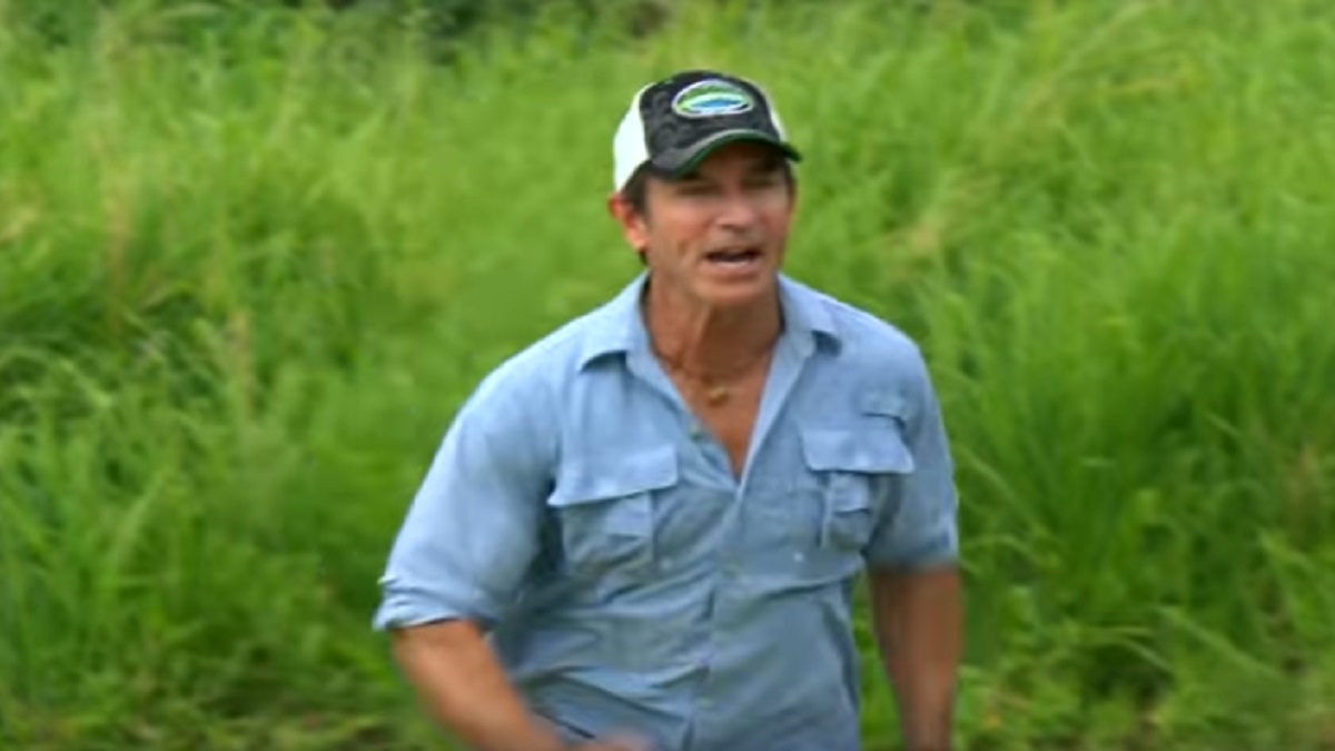Survivor host Jeff Probst runs to help a castaway during Edge of Extinction