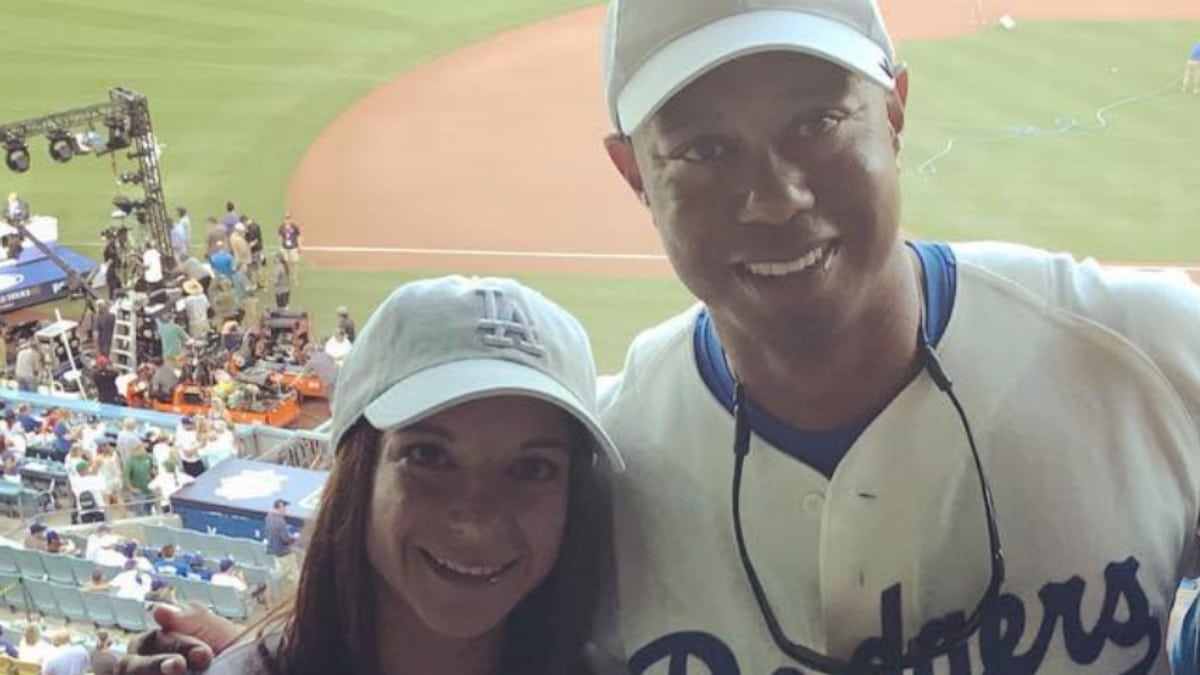 Tiger Woods and Erica Herman at a Dodgers game