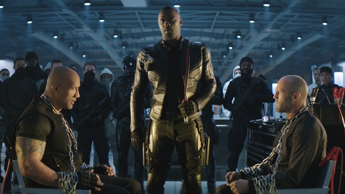 Dwayne Johnson and Jason Statham being tortured by Idris Elba in Hobbs and Shaw