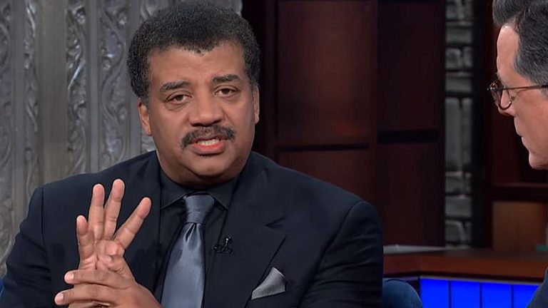 Last night Neil degrasse Tyson talked his accusations and the year afterwards, his new book and Pluto with Colbert. Pic credit: CBS