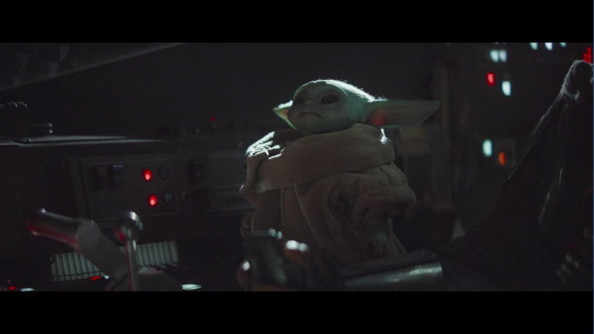 Baby Yoda fidgets with ship on The Mandalorian