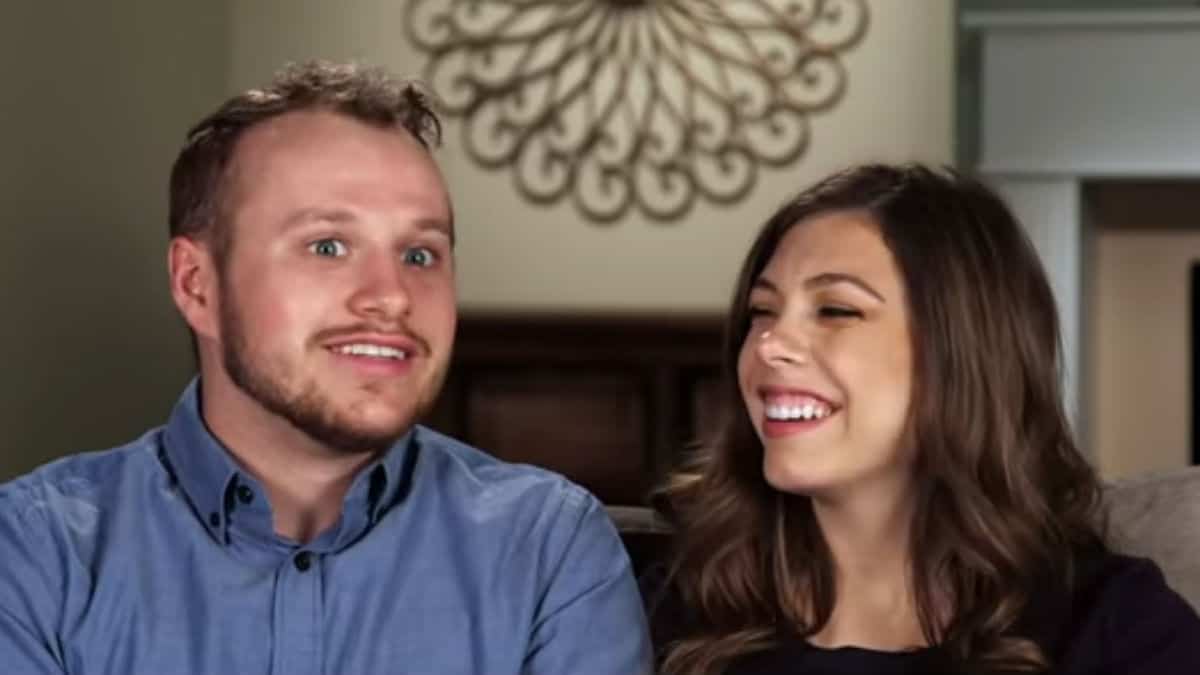 Josiah Duggar and Lauren Swanson in a Counting On confessional.