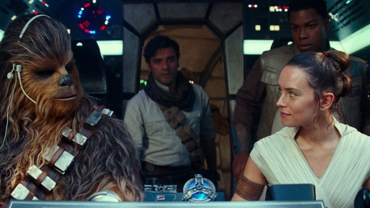 Cast members from The Rise of Skywalker enter the cockpit of The Millenium Falcon