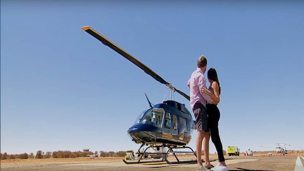 In Part 1 of The Bachelor's season 24 finale,Peter Weber and Hannah Anne embrace in front of a helicopter in Australia.