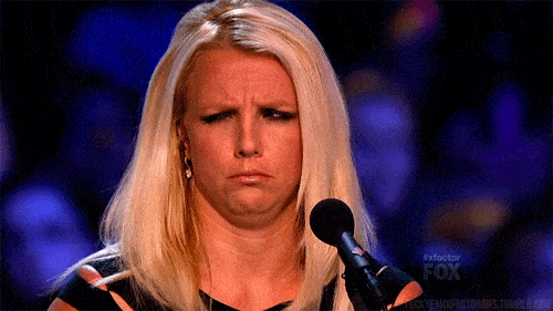 Britney Spears judges singers and looks confused