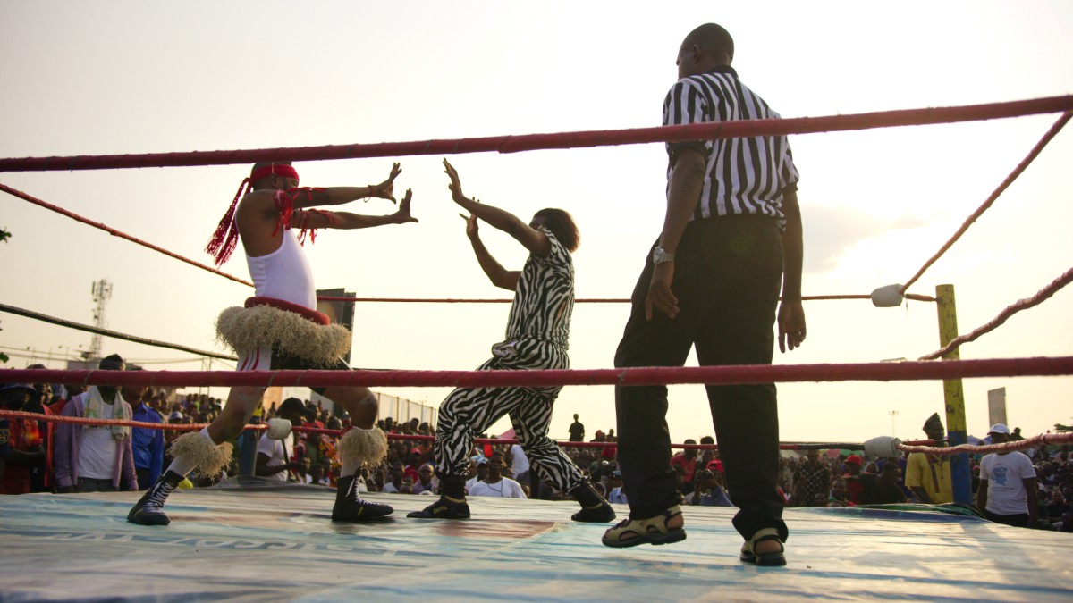 Two wrestlers competing in Catch Fétiche also known as Voodoo Wrestling