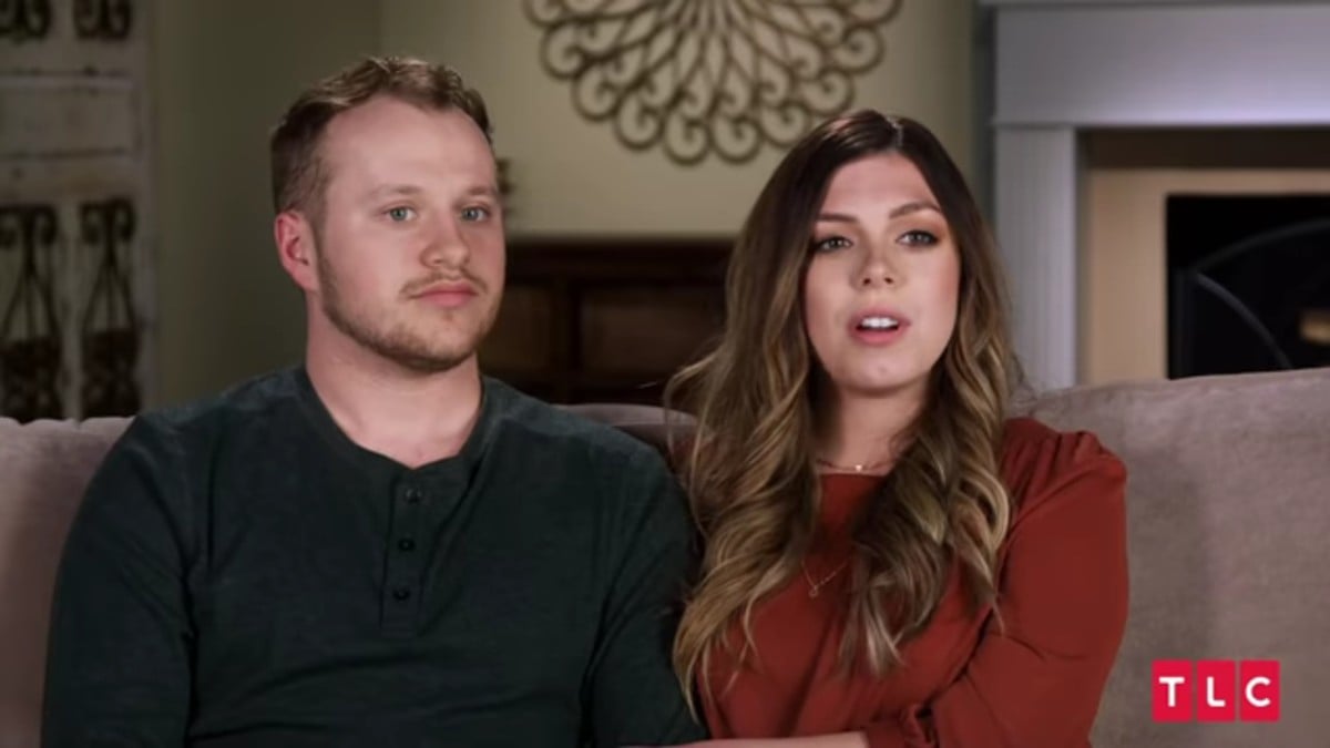 Josiah Duggar and Lauren Swanson in a Counting On confessional.
